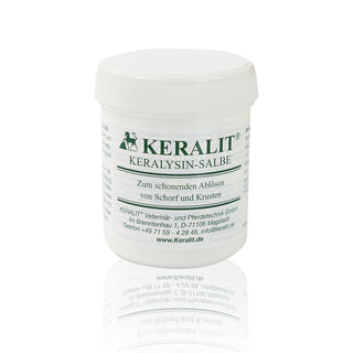 A tin of Keralit Keralysin ointment to gently remove crusts